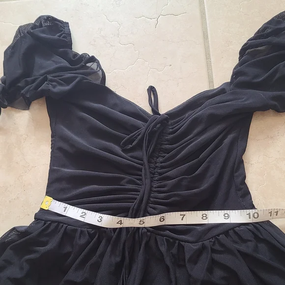 Elegant Black Dress with Sheer Sleeves - Picture 8 of 14